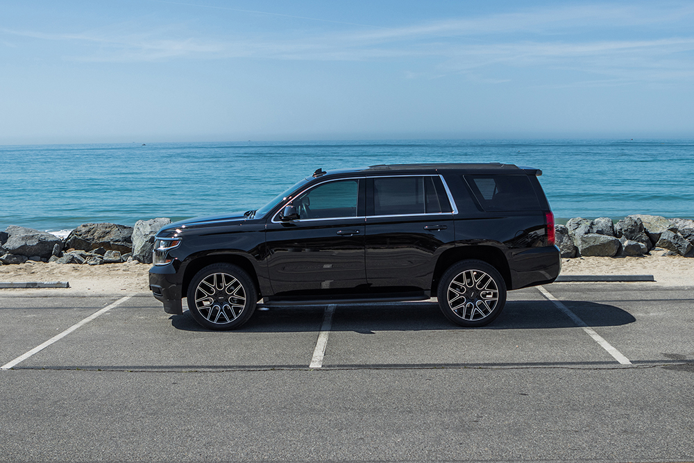 Side View of a Black Chevy Tahoe on Machined SUV Wheels Next to the Beach
