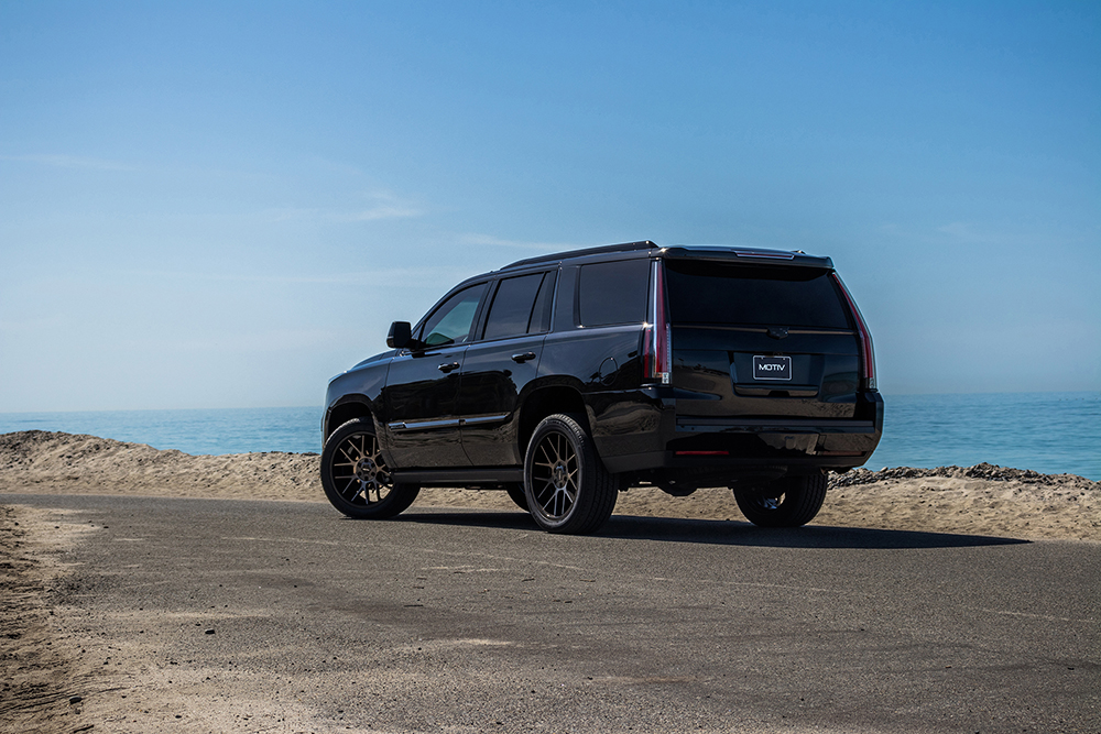 Back View of Black Escalade on Black Rims